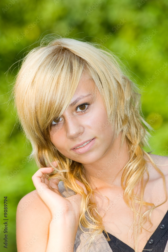 Beautiful young blonde having good time outdoors Beautiful young blonde having good time outdoors