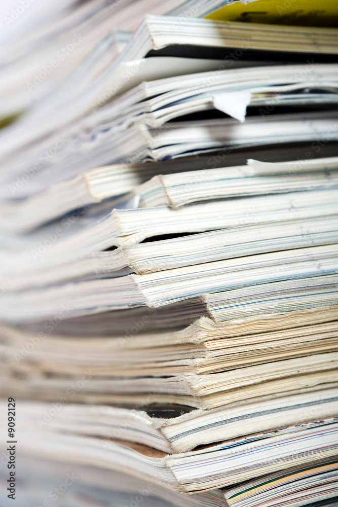 Stack of paper on neutral background close up Stack of paper on neutral background close up