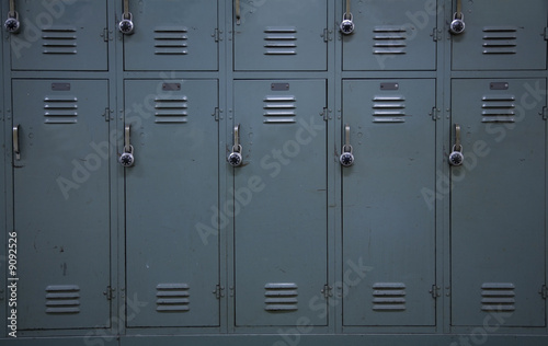 Obraz na plátně Green colored school lockers, typical of a high school.