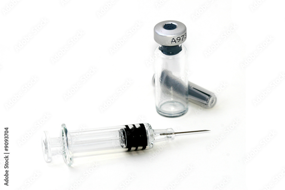 syringe needle and medical stuff on white surface syringe needle and medical stuff on white surface