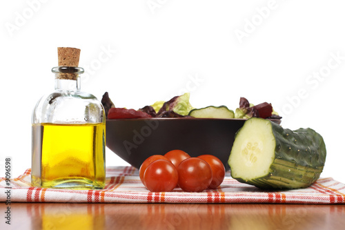 Fototapeta Naklejka Na Ścianę i Meble -  Mediterranean salad with lettuce tomatoes cucumber oil and beet