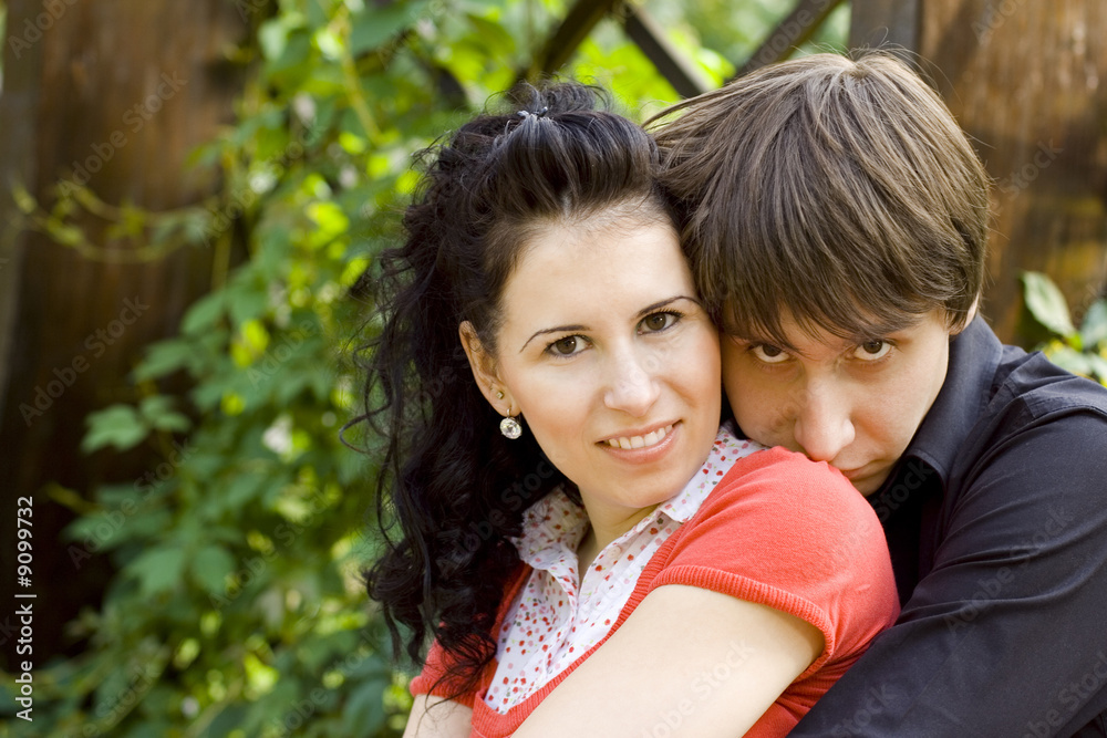outdoor portrait of young happy attractive couple together outdoor portrait of young happy attractive couple together