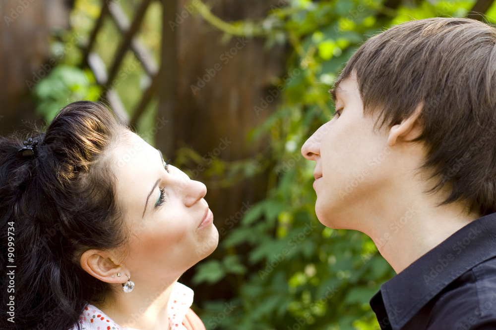outdoor portrait of young happy attractive flirting couple outdoor portrait of young happy attractive flirting couple