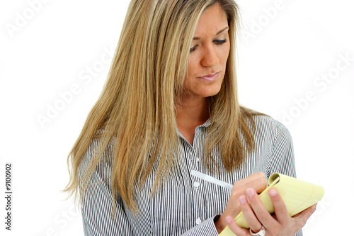 Woman Writing In A Notebook...