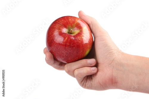 Photography Red apple in a hand