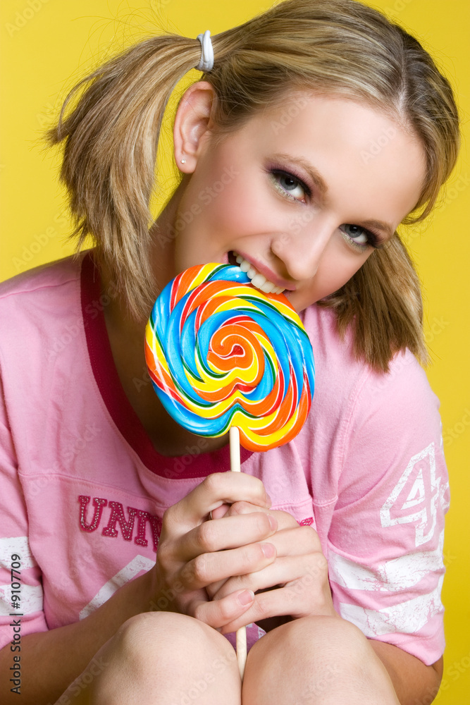 Girl Biting Lollipop