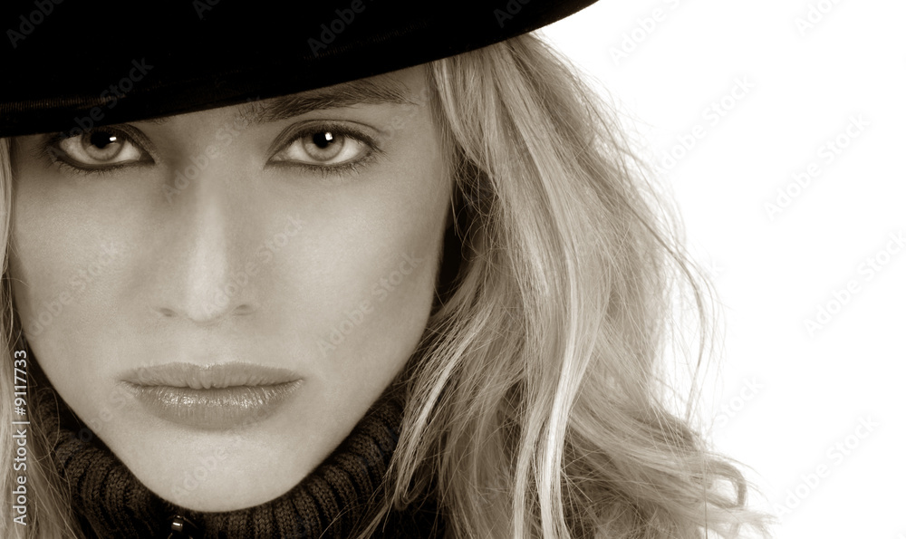 Beautiful Blond woman with bowler hat on white Beautiful Blond woman with bowler hat on white