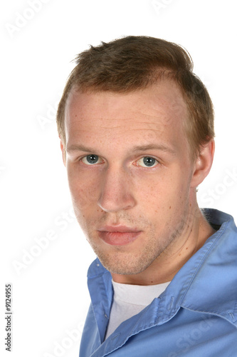attractive young man with thinning hair on his temples