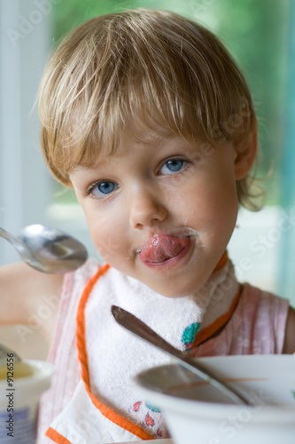 beautiful little girl during a meal