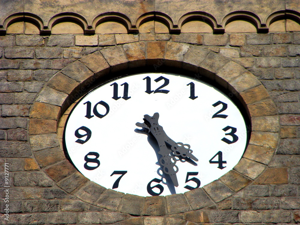 Clock on a church tower in Zabrze Clock on a church tower in Zabrze