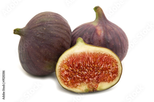 three figs on white background