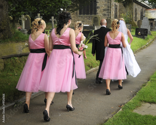 Bride and Bridesmaids walking to the church
