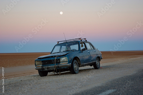Leaved old rusty arabic car in desert