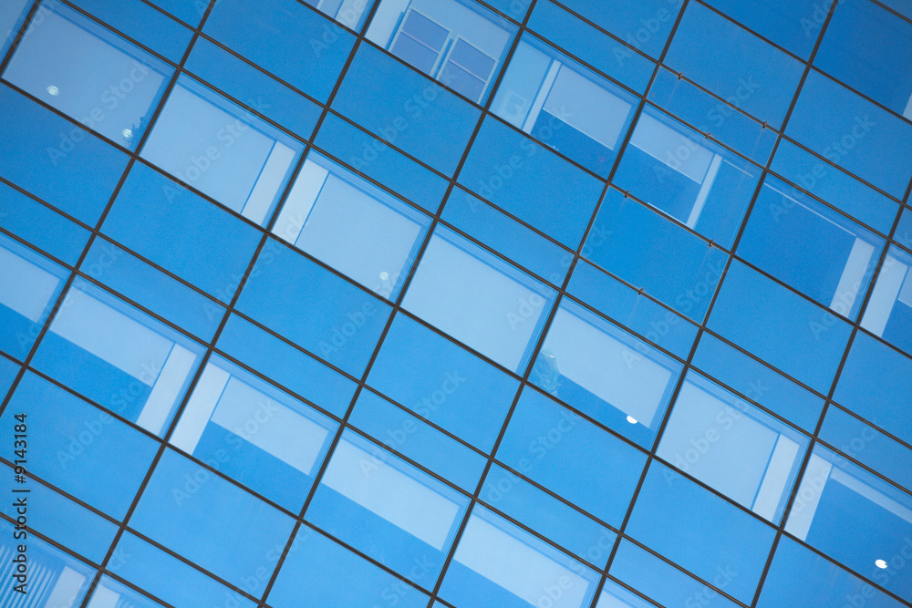 Close up of office building windows with blue glass Close up of office building windows with blue glass