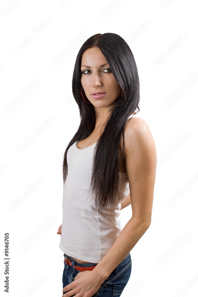 The beautiful young woman in jeans. Isolated on white background The beautiful young woman in jeans. Isolated on white background