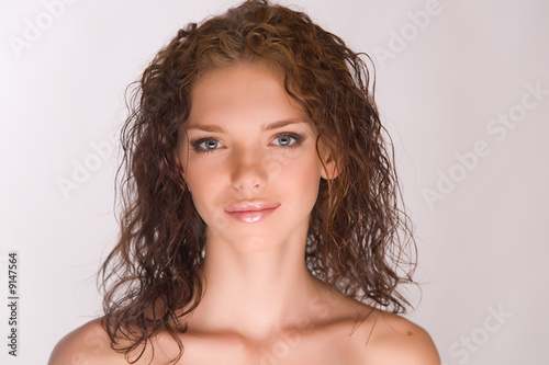 Sensual attractive young girl isolated in studio