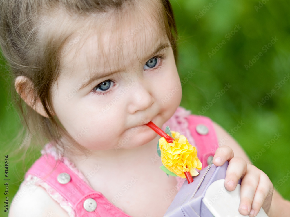 Nice 2 year old girl drinking juice Nice 2 year old girl drinking juice
