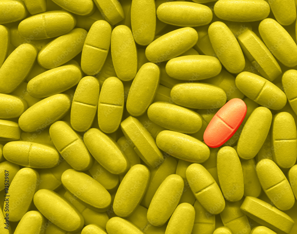 A lot of yellow pills and one red A lot of yellow pills and one red