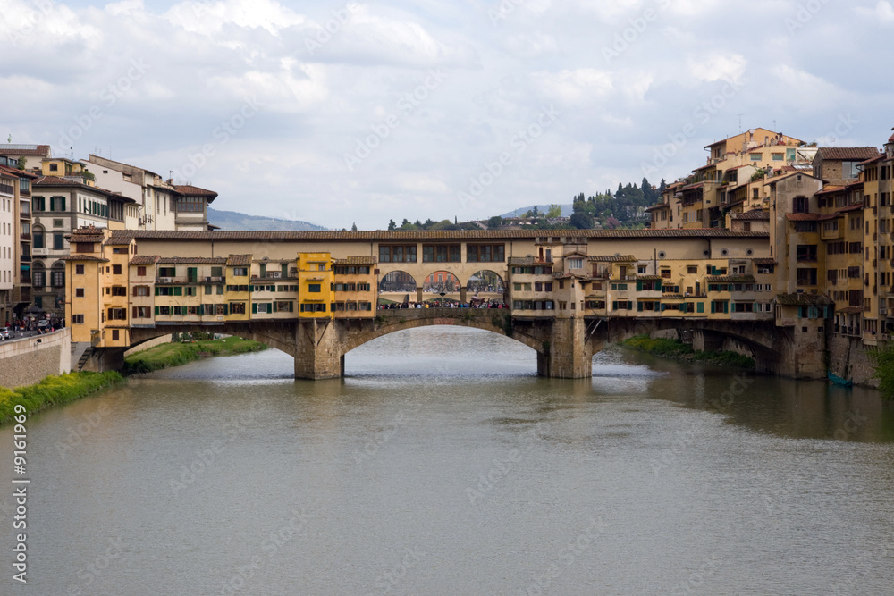 View of the Ponte Vecchio up the Arno River, Florence, Italy