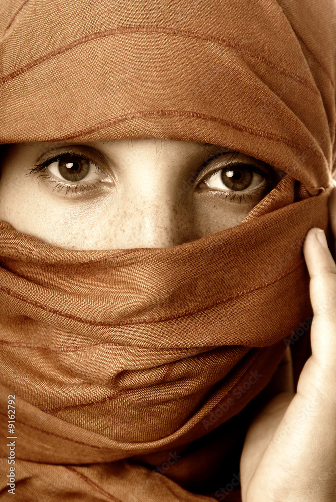 Fototapeta premium young woman close up portrait, studio picture