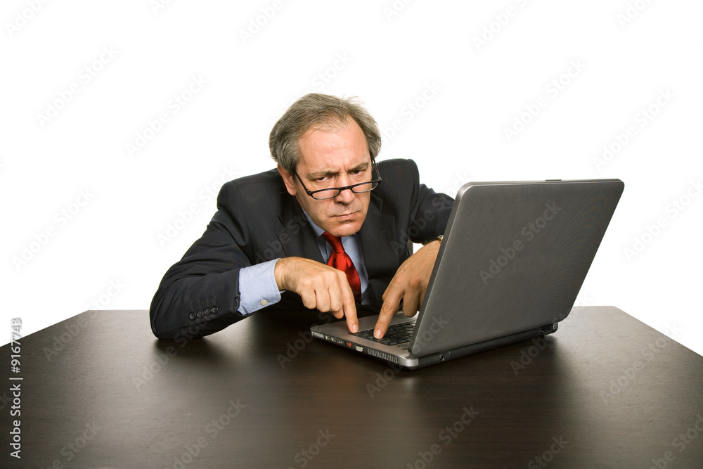 mature business man working with his laptop mature business man working with his laptop