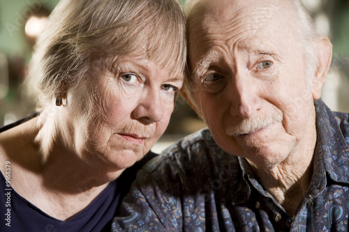 Obraz na plátně Close Up Portrait of Worried Senior Couple