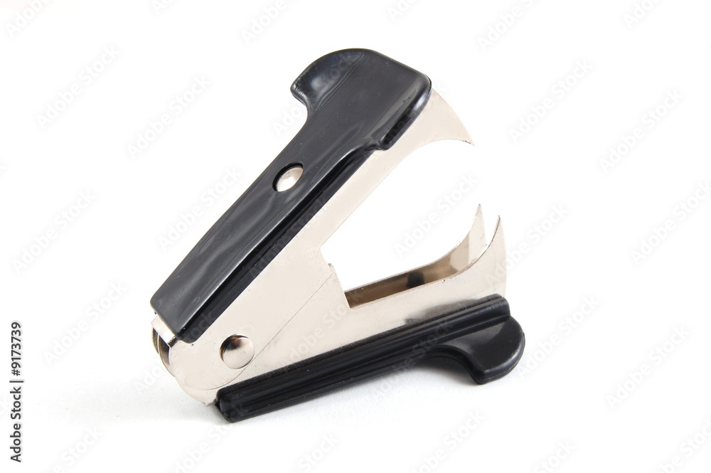 Staple remover isolated on a white background. Staple remover isolated on a white background.