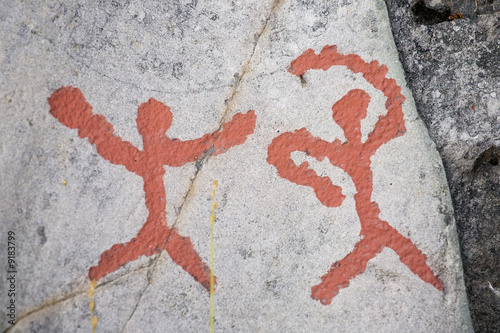 ancient petroglyphs rock carvings representing of two people