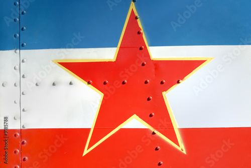 Φωτογραφία Yugoslav flag on the airplane tail, red star