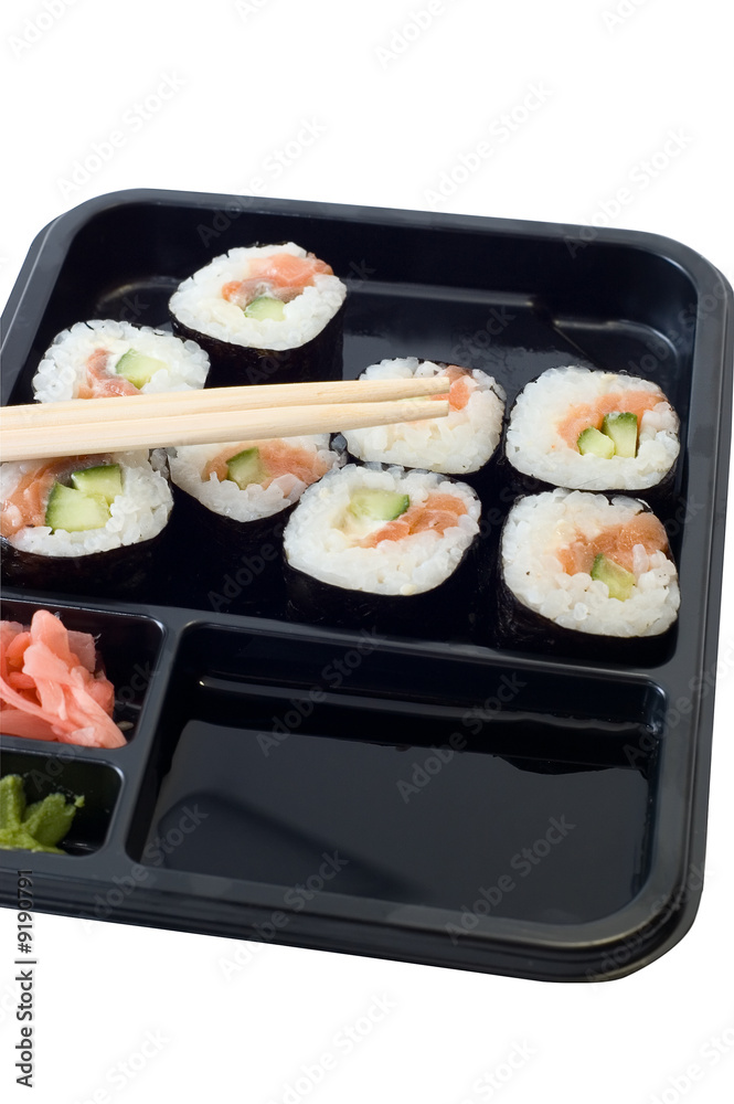 Rolls of sushi on a plate with chopsticks. Rolls of sushi on a plate with chopsticks.