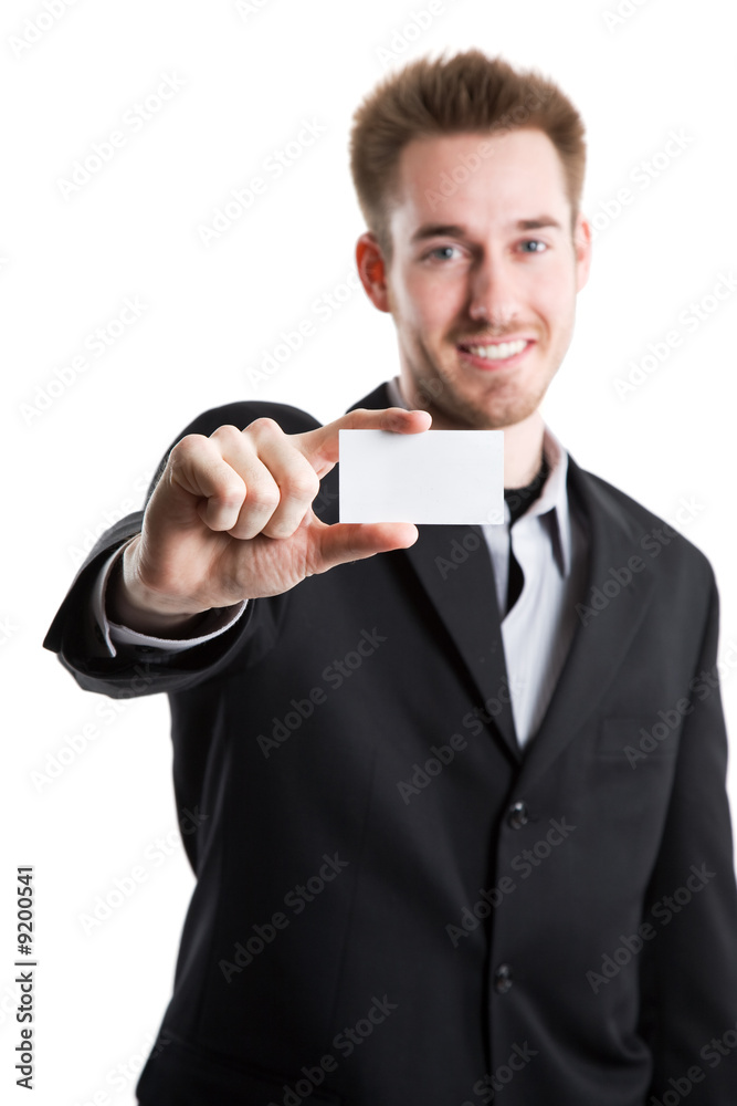 A caucasian businessman showing his business card A caucasian businessman showing his business card
