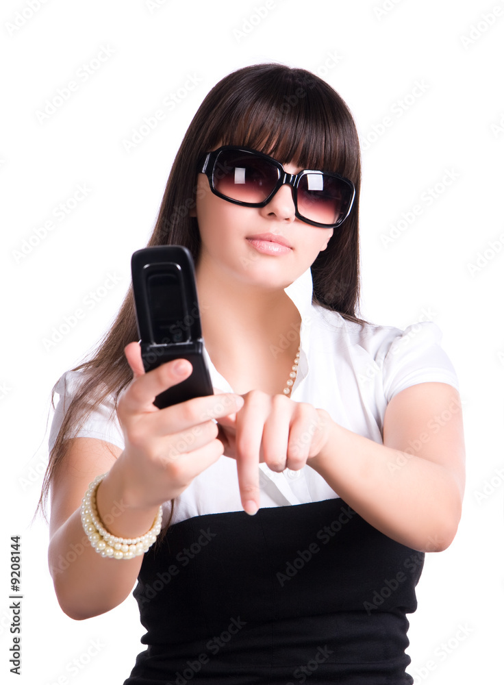 Woman pressing button on mobile phone. Isolated on white. Woman pressing button on mobile phone. Isolated on white.