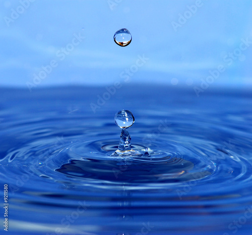 drop of water falls downward