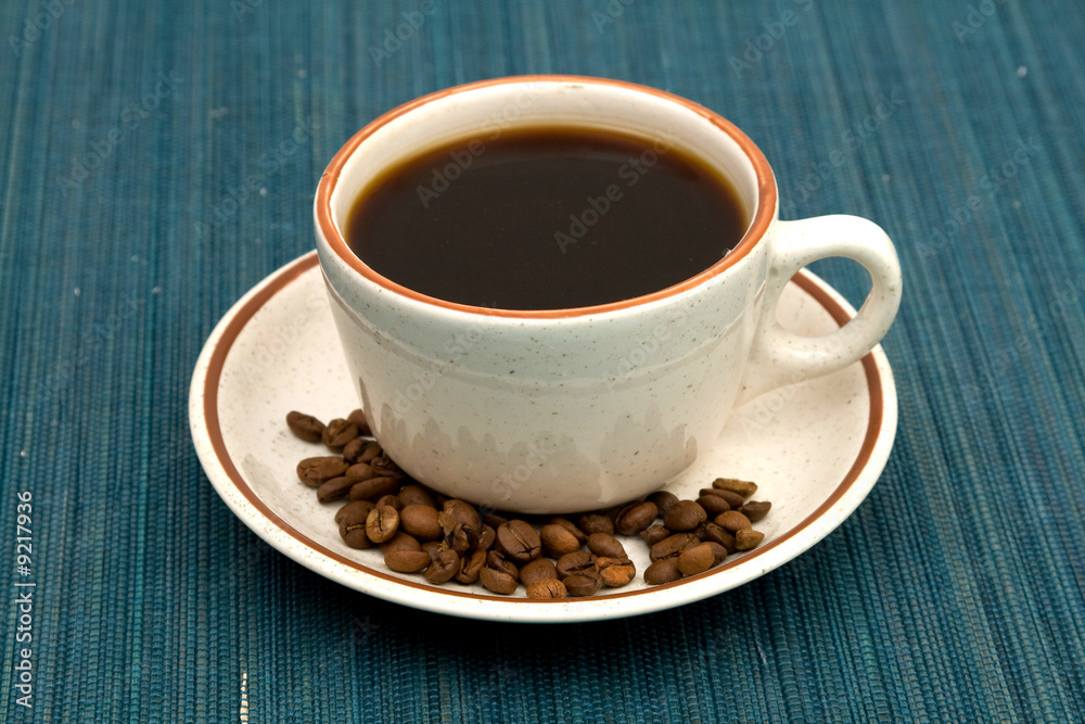 Fototapeta premium cup of coffee on the table