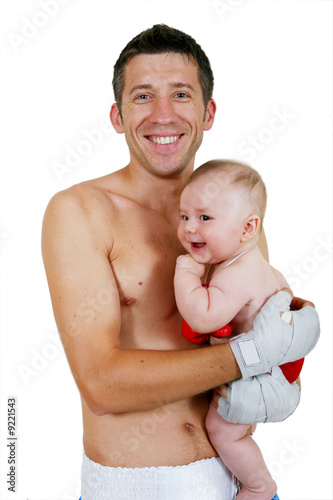 Obraz na plátně Portrait of the small and adult  boxer on a white background