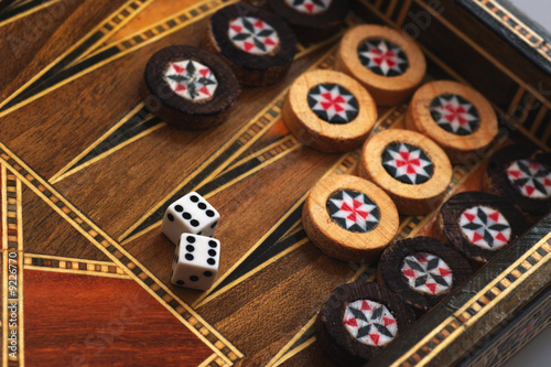 The backgammon and dice with six double