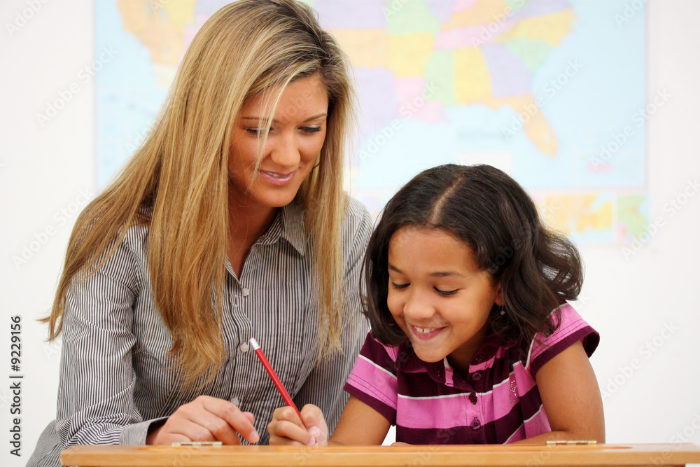Teacher and Student In A Classroom At School Teacher and Student In A Classroom At School
