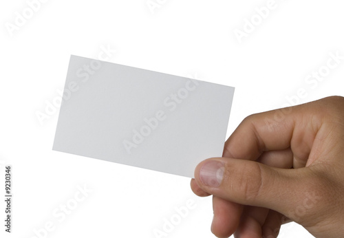 Blank business card in hand isolated on white