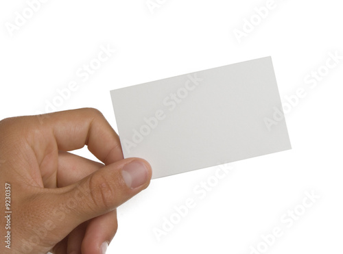 Blank business card in hand isolated on white