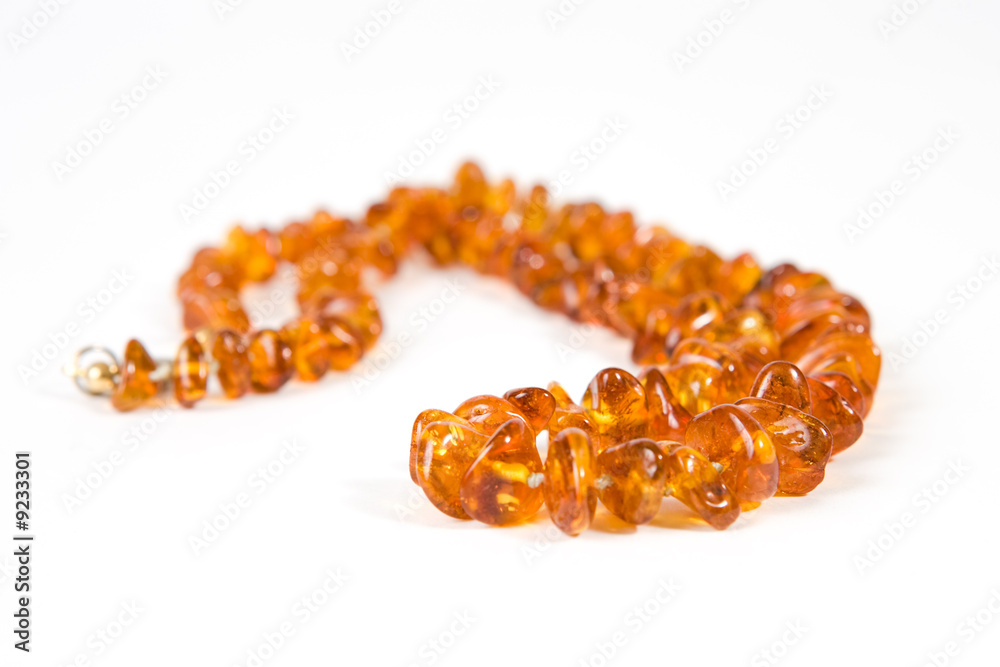 Amber necklace on white background Amber necklace on white background