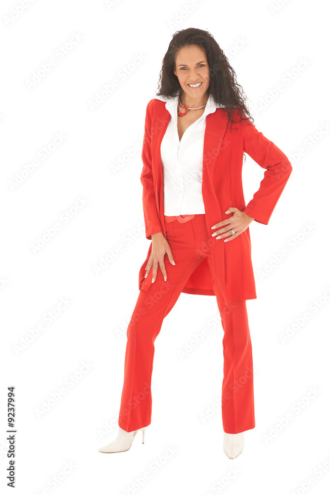 Young adult Caucasian businesswoman wearing a red suit Young adult Caucasian businesswoman wearing a red suit