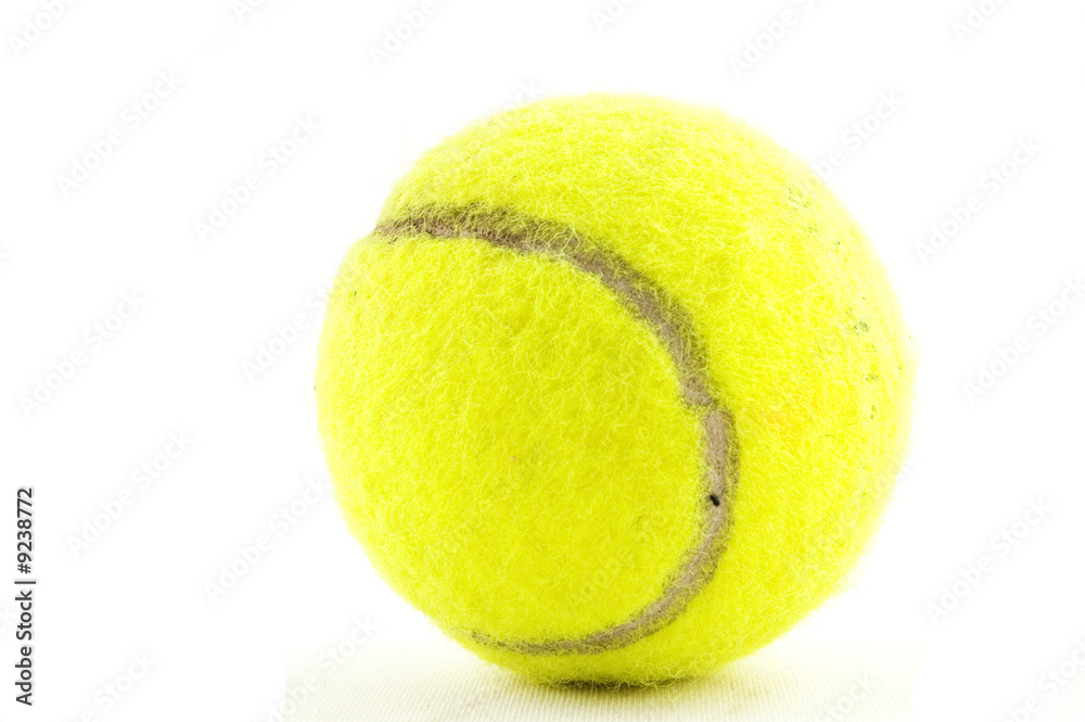 yellow tennisball isolated on a white background