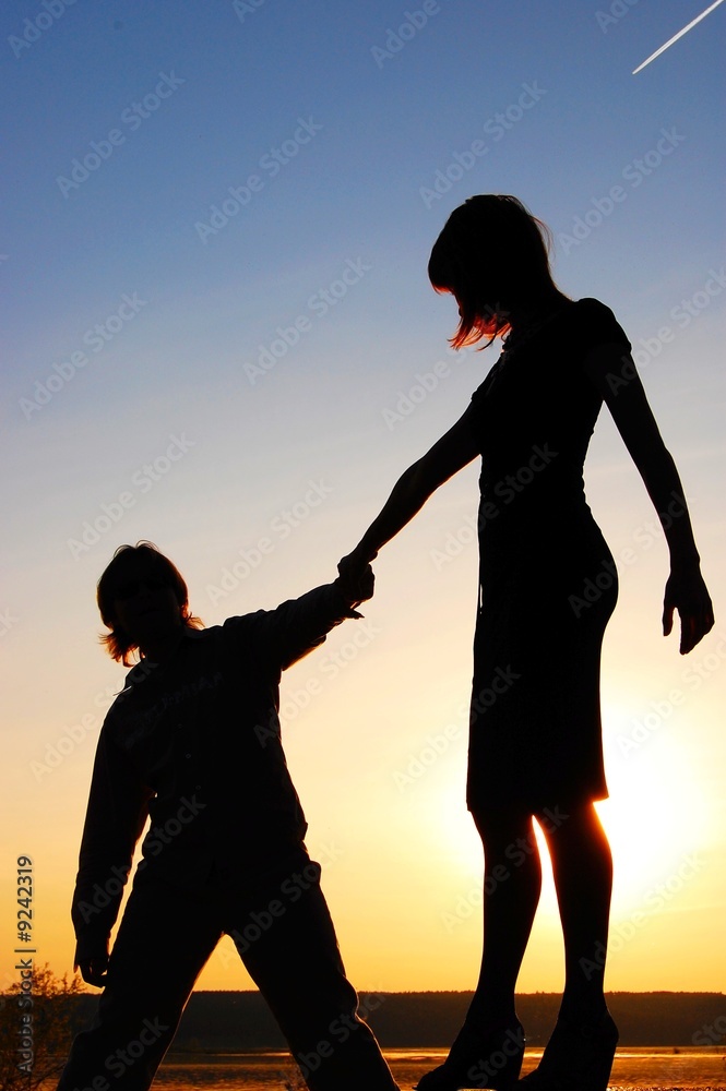 Silhouette Of Girl And Boy On Sunset In Love Couple Stock Photo Adobe Stock Silhouette Of Girl And Boy On Sunset In Love Couple Stock Photo Adobe Stock
