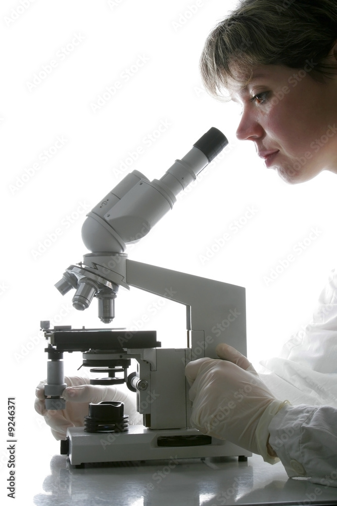 Scientist and microscope Scientist and microscope