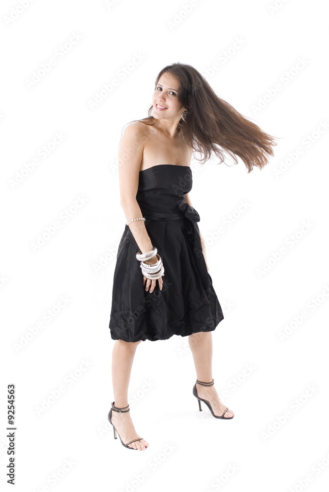 Girl in Black Dress Dancing on white . Girl in Black Dress Dancing on white .