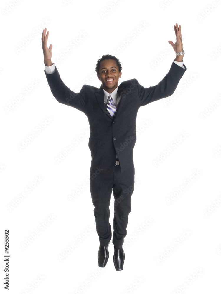 Isolated studio shot of a businessman jumping for joy.