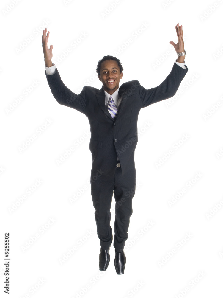 Isolated studio shot of a businessman jumping for joy. Isolated studio shot of a businessman jumping for joy.