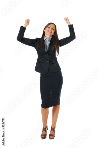 Attractive brunette businesswoman celebrating success