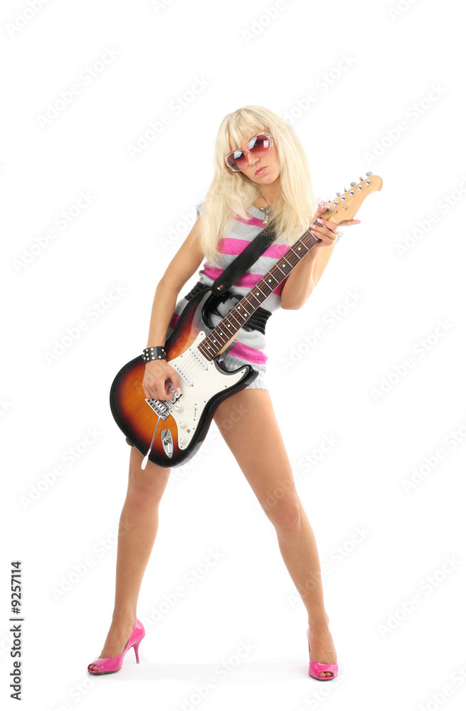 beautiful girl with a guitar on a scene