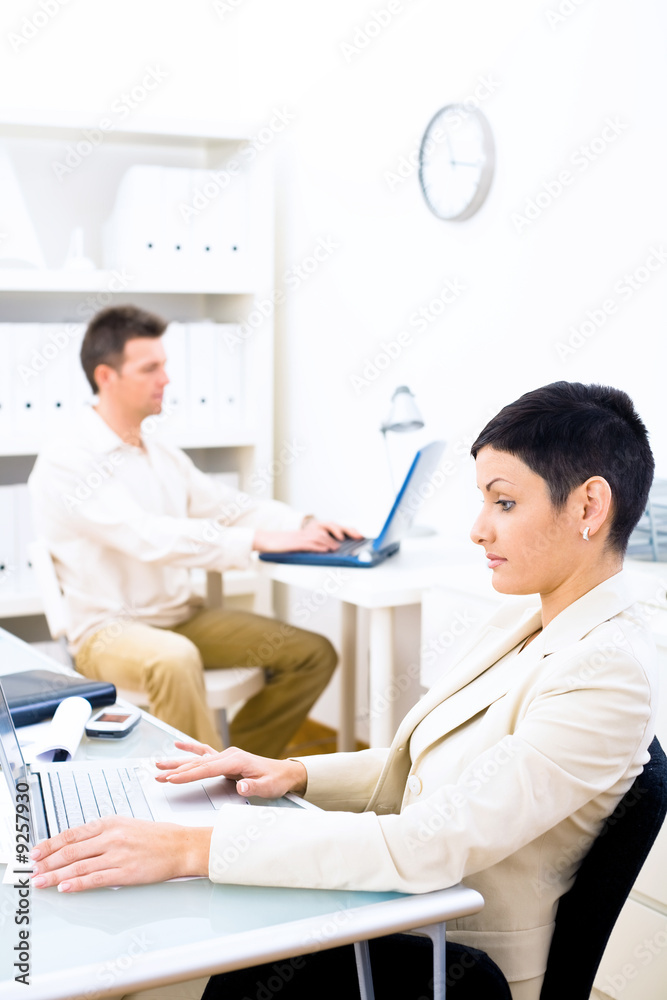 Fototapeta premium Business couple working at office.